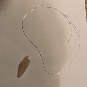 A rose quartz necklace.